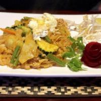 Pad Thai · Popular. Rice noodles sauteed with egg, bean sprout, scallions, ground peanuts with lum Thai...