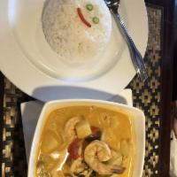 Red Curry · Red curry paste in cream of coconut, bell pepper, pineapple, bamboo shot and fresh basil, be...