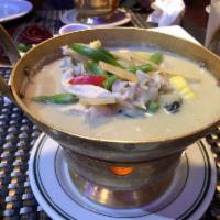 Green Curry · Thai green curry paste, coconut milk, eggplant sliced, green bean, bell pepper, and Thai swe...