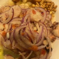 Traditional Ceviche · Corvina, cancha, choclo, red onion, sweet potato in traditional leche de tigre.