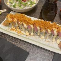 Tuna Acevichado Roll · Nikkei style sushi filled with panko shrimp and avocado, topped with thin sliced tuna, house...