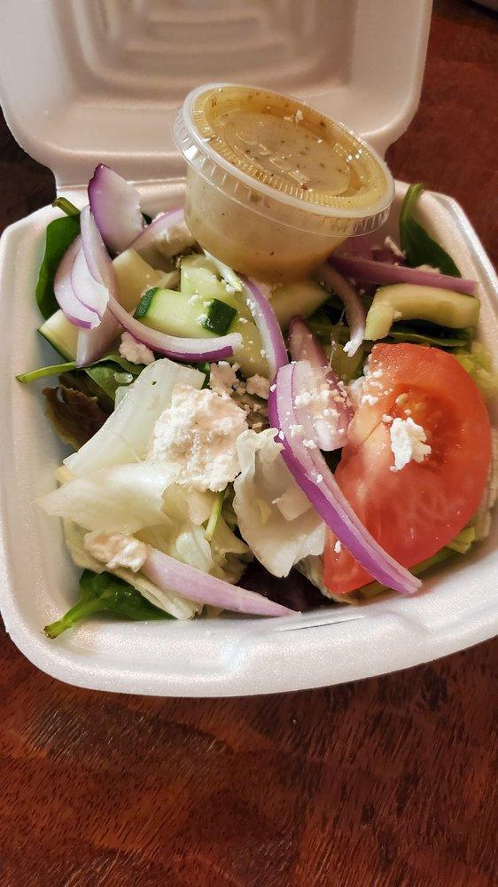 Greek Salad · A blend of iceberg and romaine lettuce with onions, tomatoes, cucumbers, bell pepper, and topped with feta cheese and kalamata olives. Add extra protein for an additional charge.