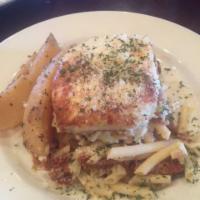 Pastitsio · A baked macaroni seasoned with ground beef and topped with bechamel sauce with choice of 2 s...