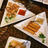 Thai House's Shrimp Rolls · 4 pieces. Fried spring roll stuffed with shrimp, chicken, vegetables, and imitation crab.