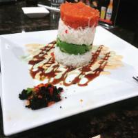 Ahi Tower Roll · Crab, avocado topped with spicy tuna, caviar with special sauce.