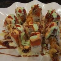 Spicy Crunch Roll · Fried shrimp, avocado, cucumber, crab topped with spicy tuna and crunch flakes with 4 season...