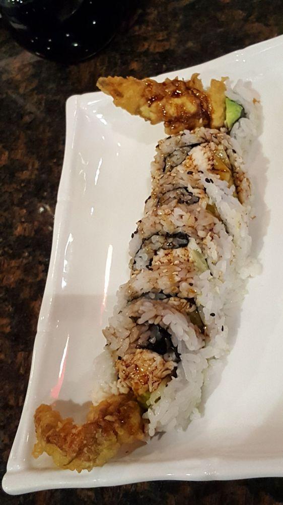 Spider Roll · Soft shell crab, crab, cucumber and avocado with sweet sauce.