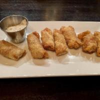 Corned Beef Spring Rolls · Stuffed with corned beef, cabbage and potatoes. Housemade creamy mustard.