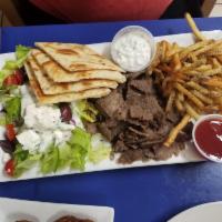 Gyro Platter · Slowly cooked beef & lamb. Served with Greek salad, pita bread, tzatziki and your choice of ...