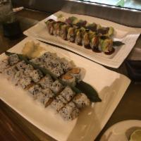 Galaxy Roll · Soft shell crab and cucumber inside, topped with spicy tuna with a layer of avocado that cov...