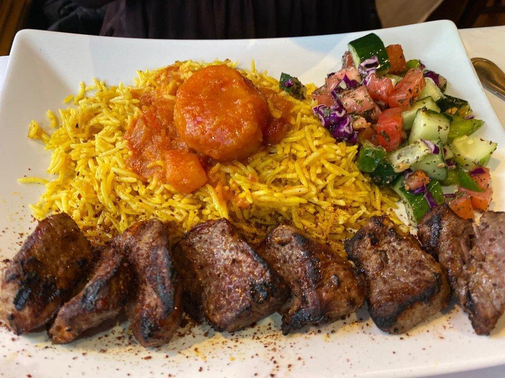 Lamb Kabob · Marinated lamb chunks char-broiled with fresh tomatoes, onions and bell peppers. Served with rice.
