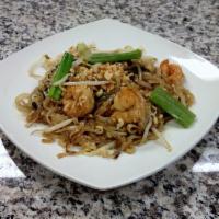 Pad Thai Noodles · Rice noodles sauteed with house tamarind sauce, eggs, green onion and bean sprout topped wit...