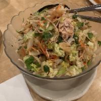 Chinese Chicken Salad · Tender shredded chicken breast with shredded lettuce, julienne carrots, green onions, cilant...