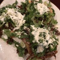 Sopes · 3 thick cornmeal small flatbreads. Layered with beans and meat choice. Topped with lettuce, ...
