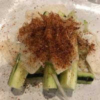 Pepinos · Light snack of sliced cucumbers and jicama tossed in fresh lime juice and mild chili seasoni...