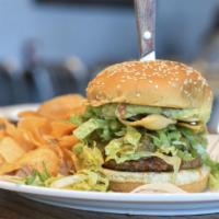 The Bigger Mac Burger · Two 1/4 lb. grass-fed patties, special sauce, lettuce, cheese, pickles, onions and sesame bu...
