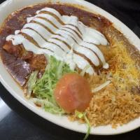 Enchiladas · 3 cheese enchiladas topped of with  Red or green sauce . Served with sour cream , rice and b...