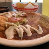 Chiles Rellenos · Pasilla pepper, stuff with cheese and cover in egg topped of with ranchera sauce , sour crea...