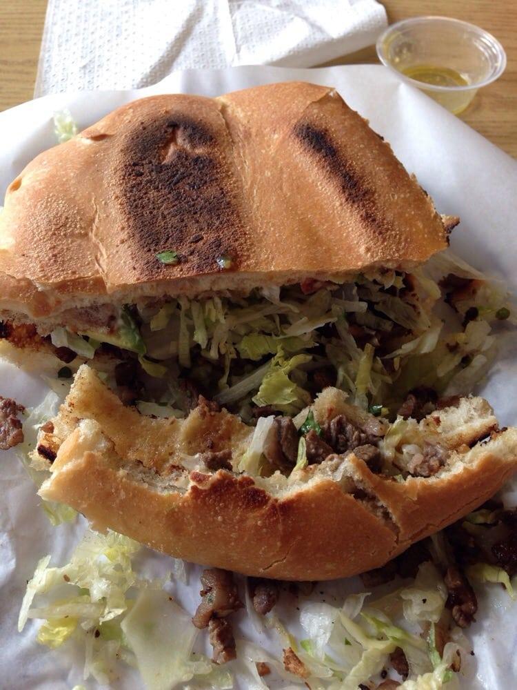 Torta · Your choice of meat, beans, mayonnaise, lettuce, tomato, onion and avocado grilled on a roll.	
