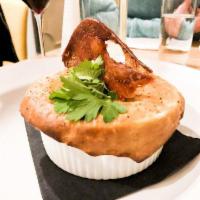 Chicken Pot Pie · Roasted chicken, carrot, petite peas, celery and black pepper thyme crust.