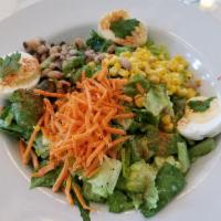 Colleen's Cobb Salad · Romaine, house deviled eggs, red onion, cherry tomatoes, bacon, blue cheese, poppy seed vina...