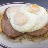 Olympian Breakfast · Special. A local favorite! Hash browns topped with layers of Swiss and American cheese, 2 sl...