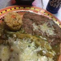 Enchiladas · Beef, chicken or cheese. Rice and beans