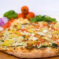 Green Monster Artichoke Pesto Pizza · Artichoke hearts, fresh spinach, Roma tomatoes, fresh garlic, feta and mozzarella cheese wit...