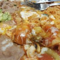2 Shrimp Enchiladas Topped with Ranchero · 