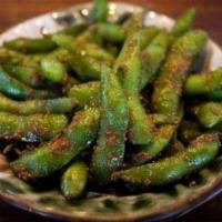 Garlic Edamame · Sautéed young Japanese soybeans with garlic, house sweet soy sauce.