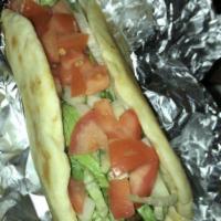 Gyro · A traditional mix of lamb and beef served on Pita bread and with lettuce, tomatoes, onions a...