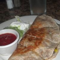 Quesadilla · A choice of tortilla filled with cheddar, Monterey Jack cheese and caramelized onions. Serve...
