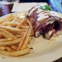 Corned Beef Boxty · Guinness braised corned beef and Swiss cheese accented with our Tavern-made horseradish sour...