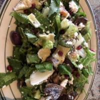 Mediterranean Salad · Medley of fresh herbs mint, romaine lettuce, spinach, parsley, chives, basil and dill with c...