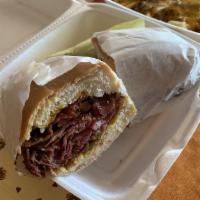 Pastrami Sandwich · Lots of grilled pastrami on a French roll with mustard and pickles. 