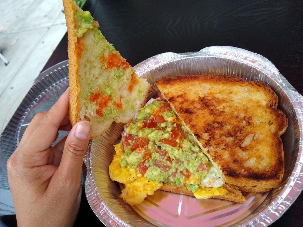 Agadir Egg Sandwich · 2 fried eggs, smashed avocado and tomato on toast.