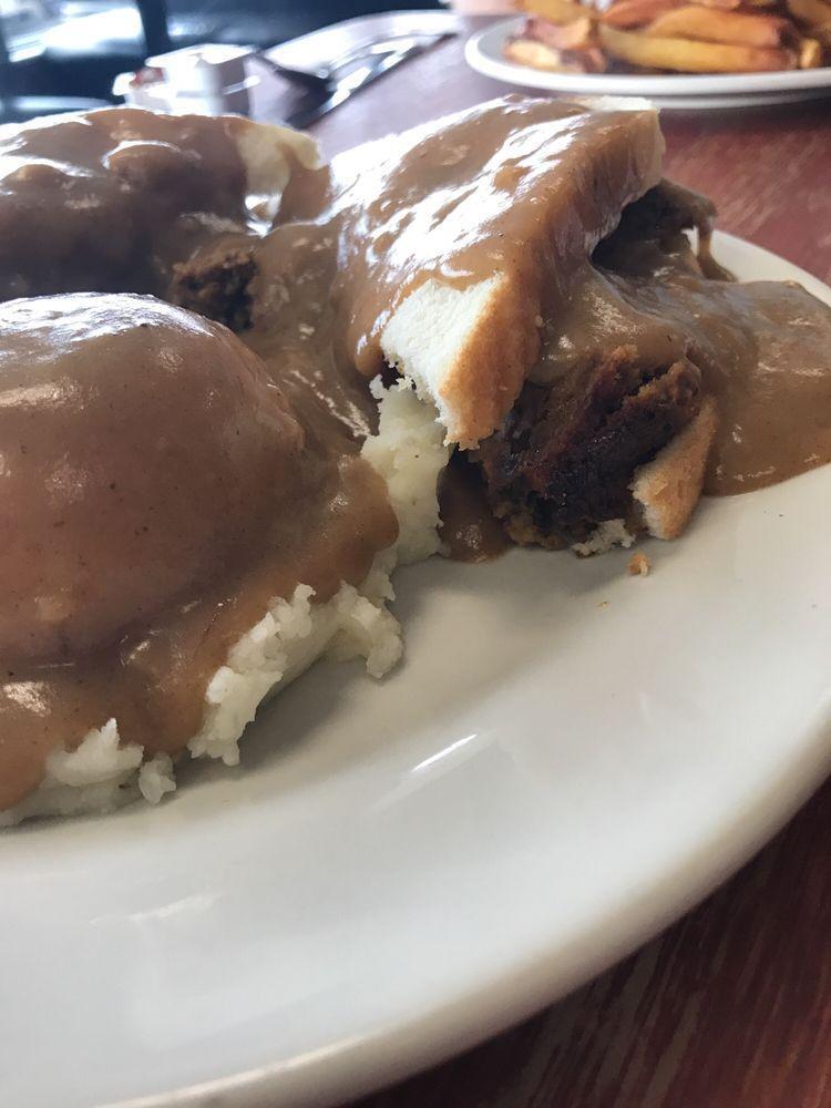 Meatloaf Sandwich · Homemade meatloaf served on bread (cut comer to corner). We recommend ordering this sandwich with homemade mashed potatoes in-between and smothered in brown gravy.
