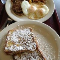 Light Street Breakfast Special · 2 eggs, a choice of meat, home fries and a choice of pancakes, waffles or French toast.