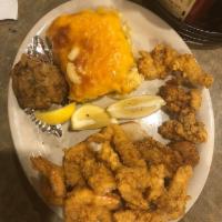 Seafood Platter · Shrimp, oyster, catfish, stuffed crab and hushpuppies.