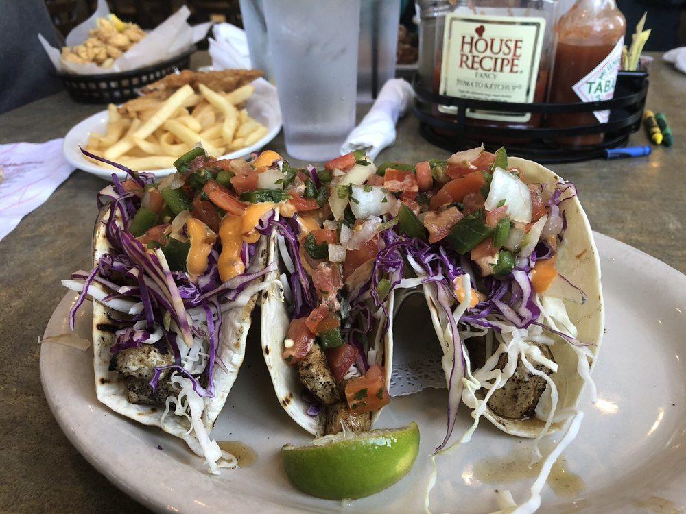 Fish Tacos · (3) Grilled mahi-mahi tacos with fresh cabbage, pico de gallo, and our special spicy mayonnaise on flour tortillas.