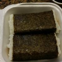Spam Musubi · 2 Spam Musubi. A block of rice topped with a dash of Teriyaki sauce and a slice of Spam, wra...