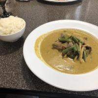 Thai Green Curry Dinner · (Spicy curry) Comes with green bell peppers, green bean, bamboo shoot, carrots and Thai basi...