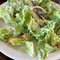 Caesar Salad · Romaine, parmesan, white anchovies, croutons and caesar dressing.