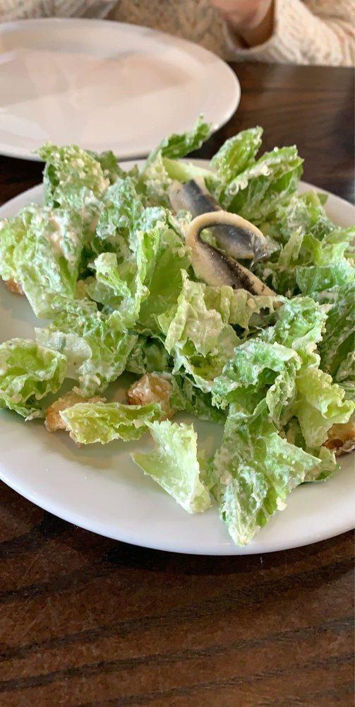 Caesar Salad · Romaine, parmesan, white anchovies, croutons and caesar dressing.