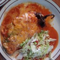 Chiles Rellenos Plate · A chili relleno lovers dream. Made from scratch. Served with rice and beans.