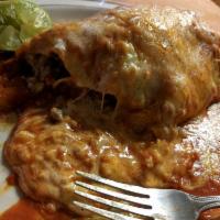 Super Jumbo Wet Burrito · Red. Choice of meat. Made with rice and beans inside.