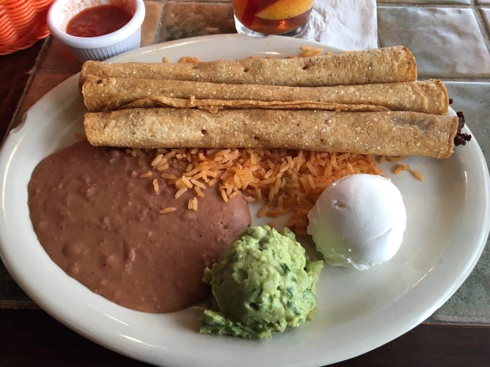 Flautas · Chicken or brisket, cheese, guacamole, sour cream, rice and beans.