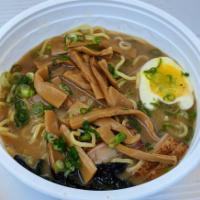 Tonkotsu Ramen · Rich pork broth with pork belly, scallions, bamboo, nori and egg.