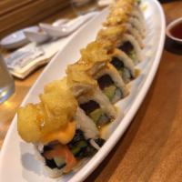 Captain Crunch Roll · Tuna, salmon, cucumber and avocado, topped with fish tempura and spicy mayo.