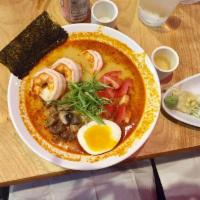 Tom Yum Shrimp Ramen · Thai spicy and sour soup with mushrooms, tomatoes, scallions and egg.